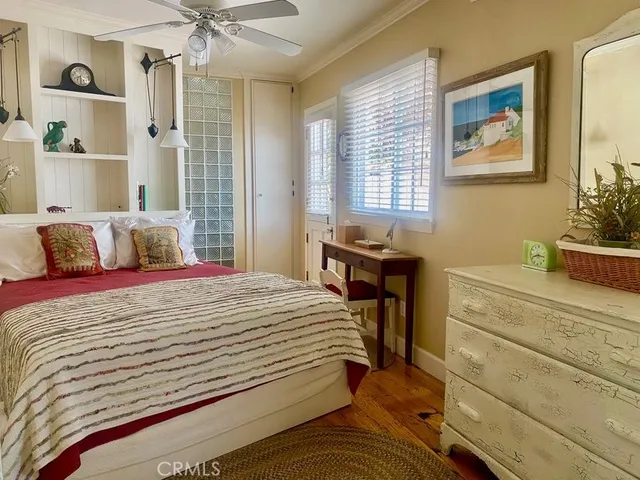 a bedroom with a bed and a table