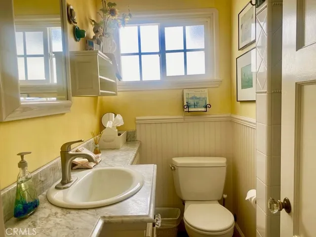 a bathroom with a sink and a toilet
