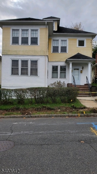 12 John Street Summit, NJ 07901 - Photo 1 of 7 a front view of a house with a yard