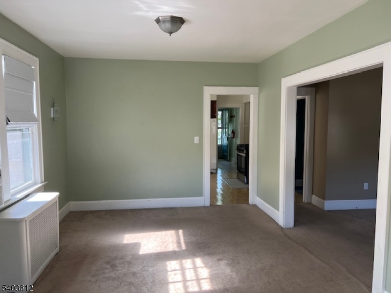 12 John Street Summit, NJ 07901 - Photo 2 of 7 an empty room with windows