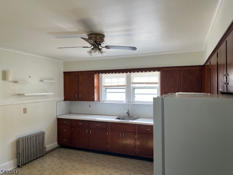 12 John Street Summit, NJ 07901 - Photo 7 of 7 a spacious bathroom with a tub sink and mirror
