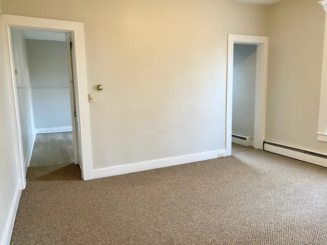 an empty room with closet