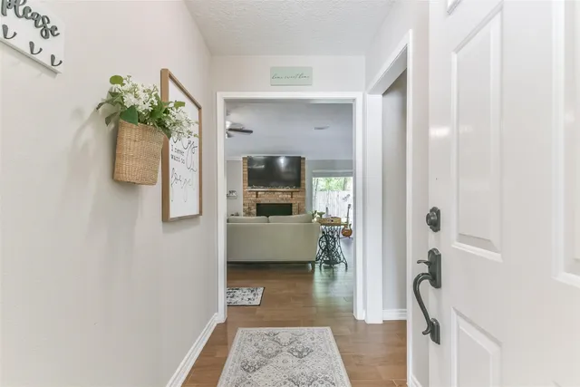 a view of a dining room with furniture and window