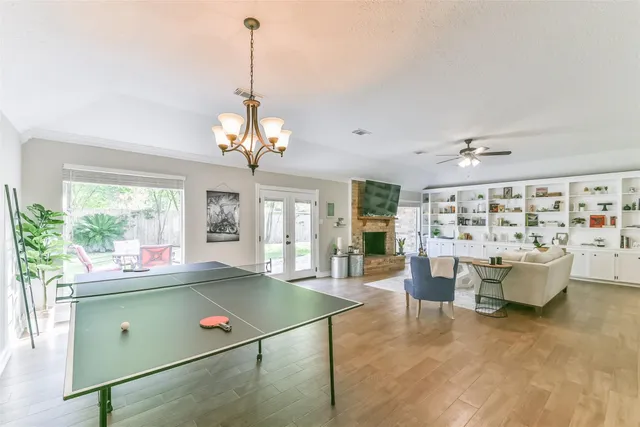 a kitchen with stainless steel appliances granite countertop a refrigerator sink and cabinets