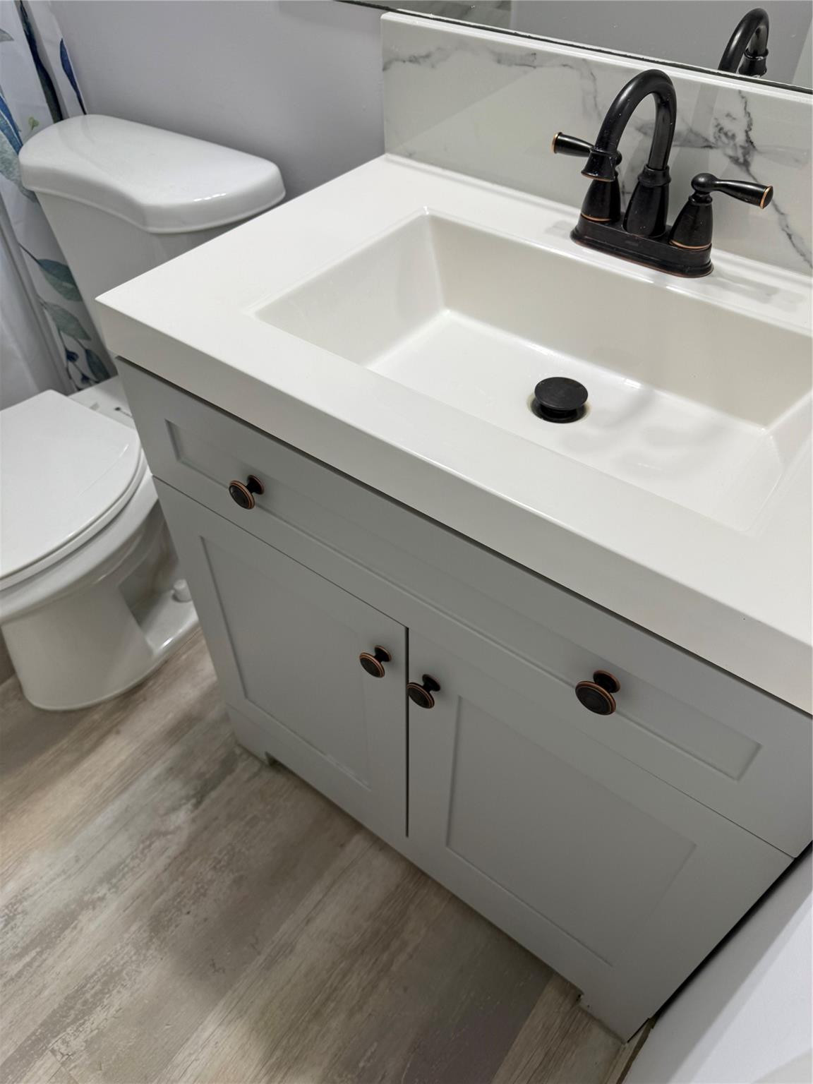 255 South Cypress Road, Unit 323 Pompano Beach, FL 33060 - Photo 7 of 11 a bathroom with a sink and toilet