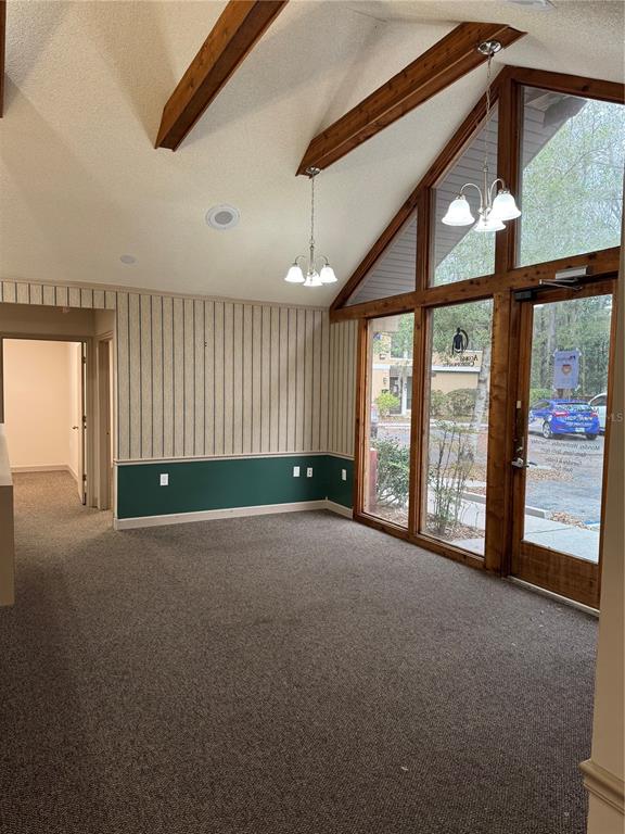 17 Northwest 33rd Court Gainesville, FL 32607 - Photo 2 of 14 a view of an empty room with a balcony