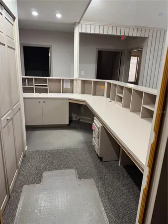 a view of living room with furniture and flat screen tv