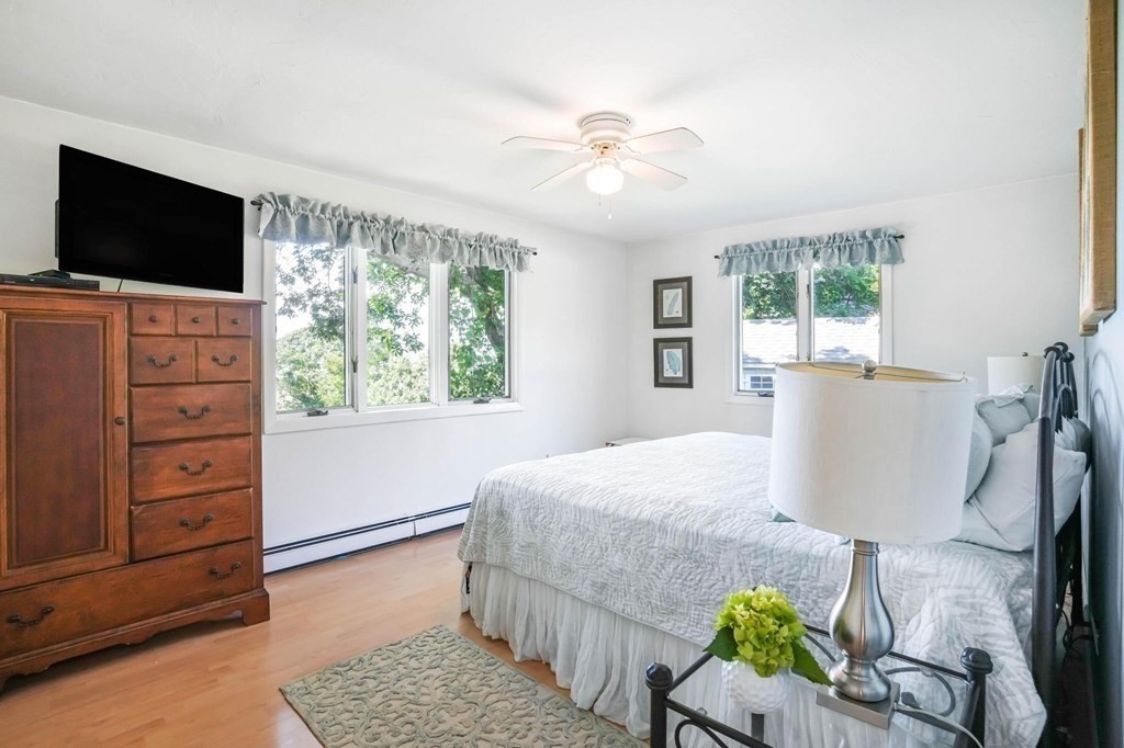 24 Jae Road Falmouth, MA 02556 - Photo 22 of 32 a bedroom with a bed and a flat screen tv