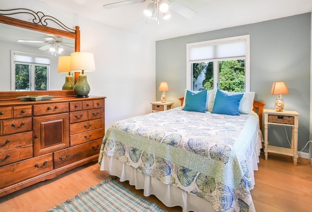 24 Jae Road Falmouth, MA 02556 - Photo 25 of 32 a bedroom with a bed and a dresser