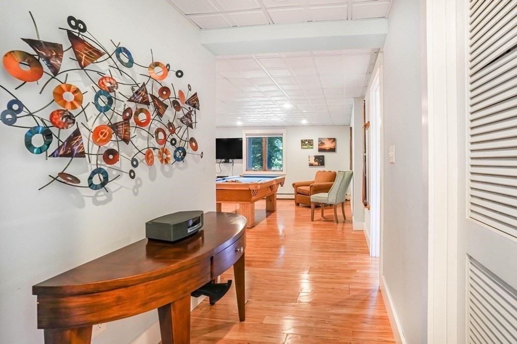 24 Jae Road Falmouth, MA 02556 - Photo 27 of 32 a living room with furniture and wooden floor