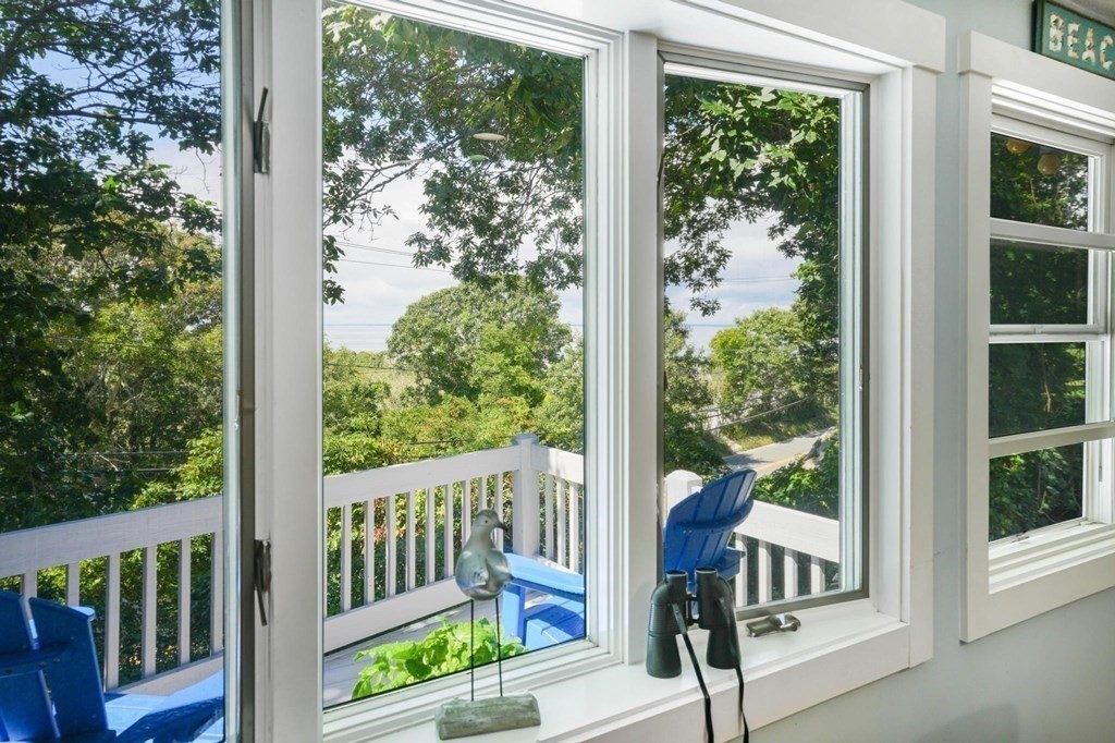 24 Jae Road Falmouth, MA 02556 - Photo 31 of 32 a view of a porch with furniture and yard