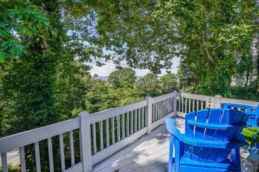 24 Jae Road Falmouth, MA 02556 - Photo 6 of 32 a view of a chair and table in the balcony