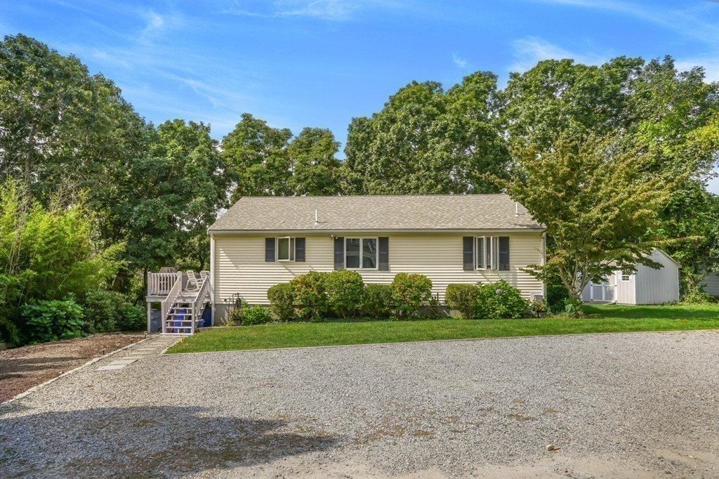 24 Jae Road Falmouth, MA 02556 - Photo 9 of 32 a view of a house with a street
