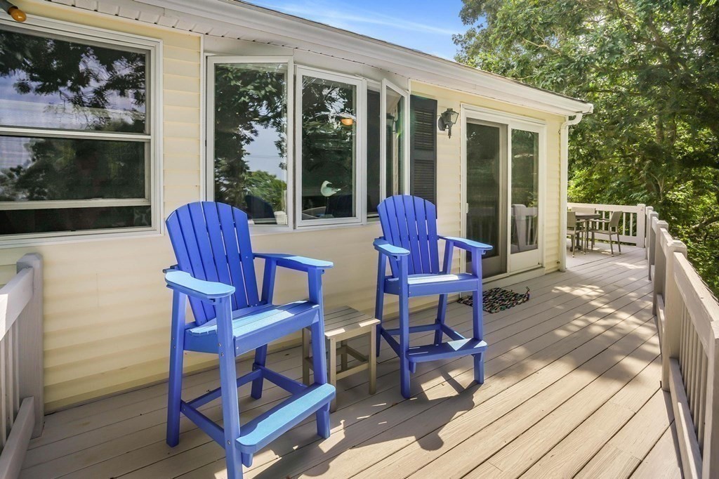 24 Jae Road Falmouth, MA 02556 - Photo 10 of 32 a view of a chairs and table in patio