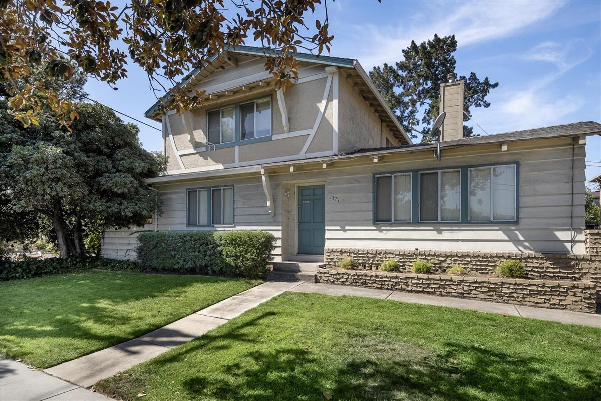 1367-1371 South Wolfe Road Sunnyvale, CA 94087 - Photo 2 of 47 a view of a house with a yard