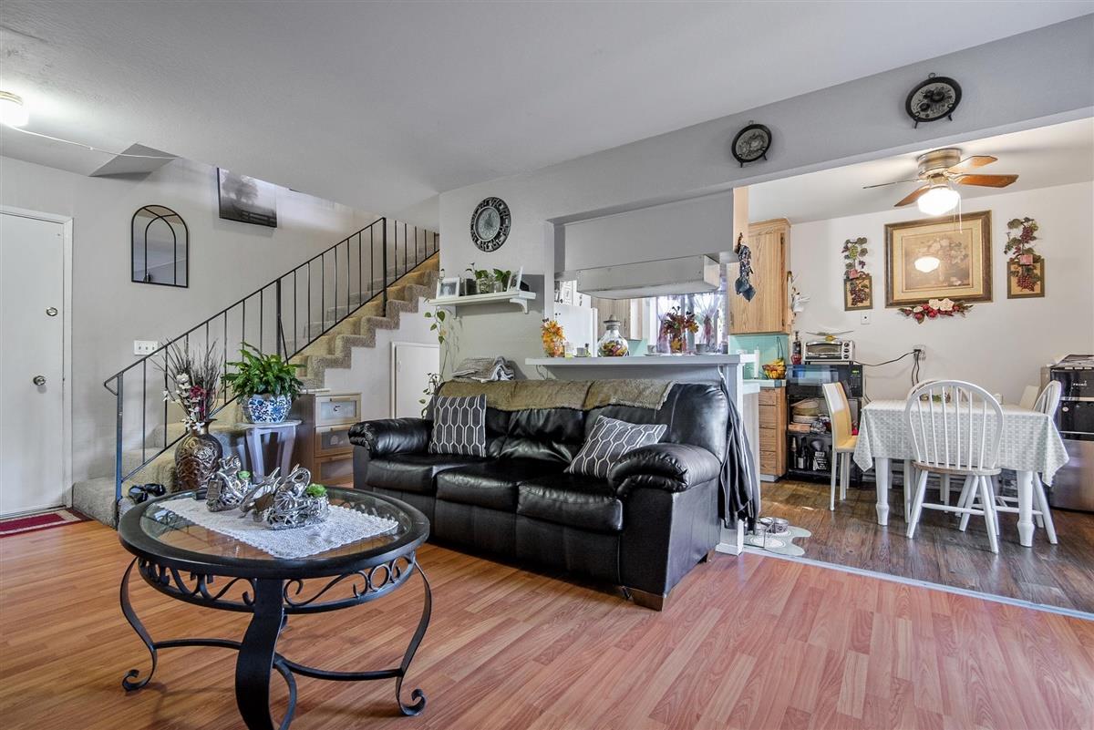 1367-1371 South Wolfe Road Sunnyvale, CA 94087 - Photo 12 of 47 a living room with furniture and wooden floor