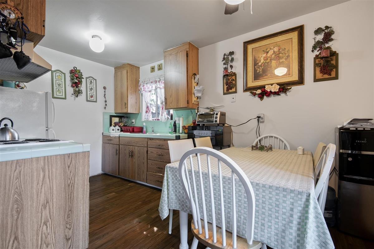 1367-1371 South Wolfe Road Sunnyvale, CA 94087 - Photo 15 of 47 a bedroom with a bed and a view of kitchen