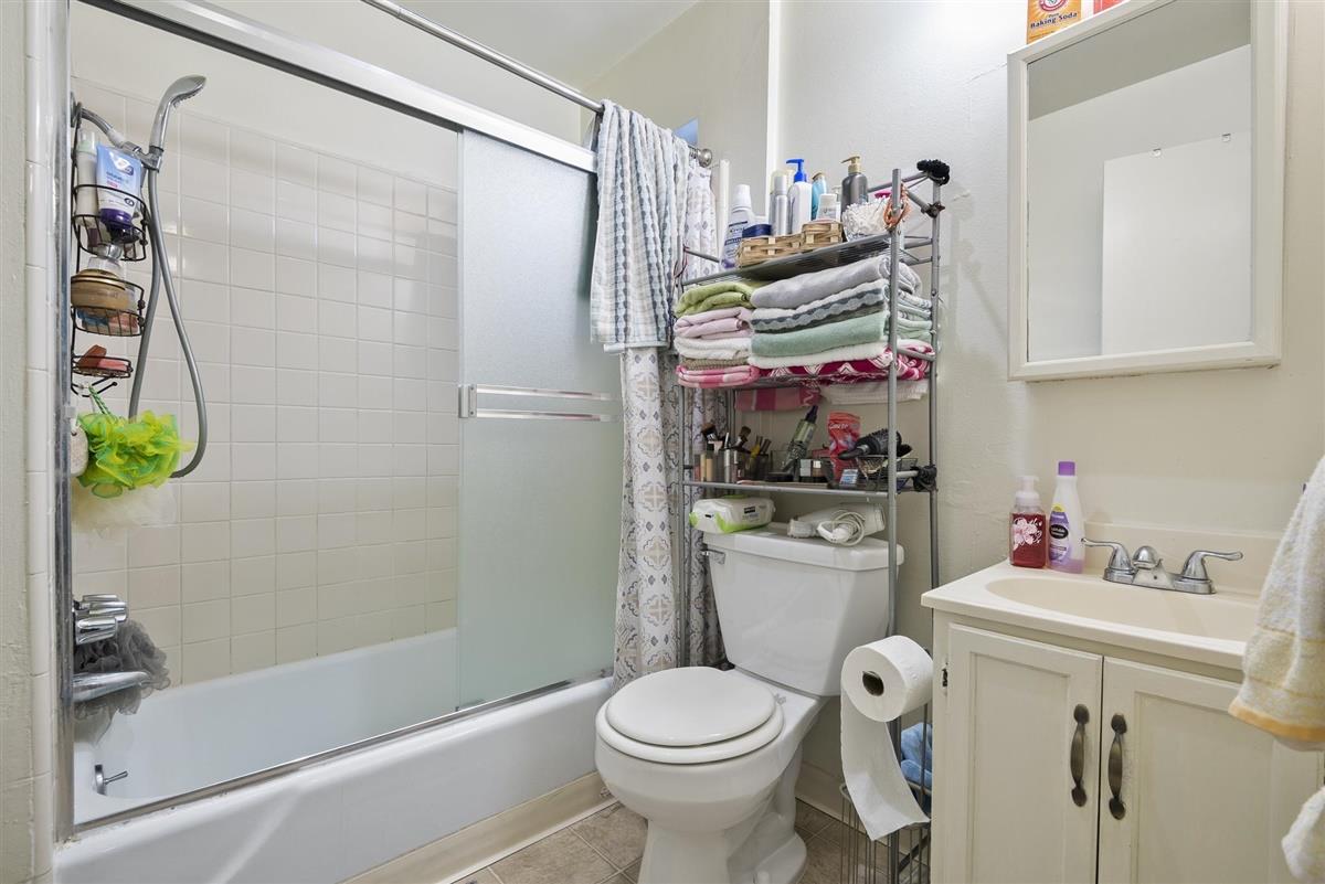 1367-1371 South Wolfe Road Sunnyvale, CA 94087 - Photo 23 of 47 a bathroom with a sink toilet and shower