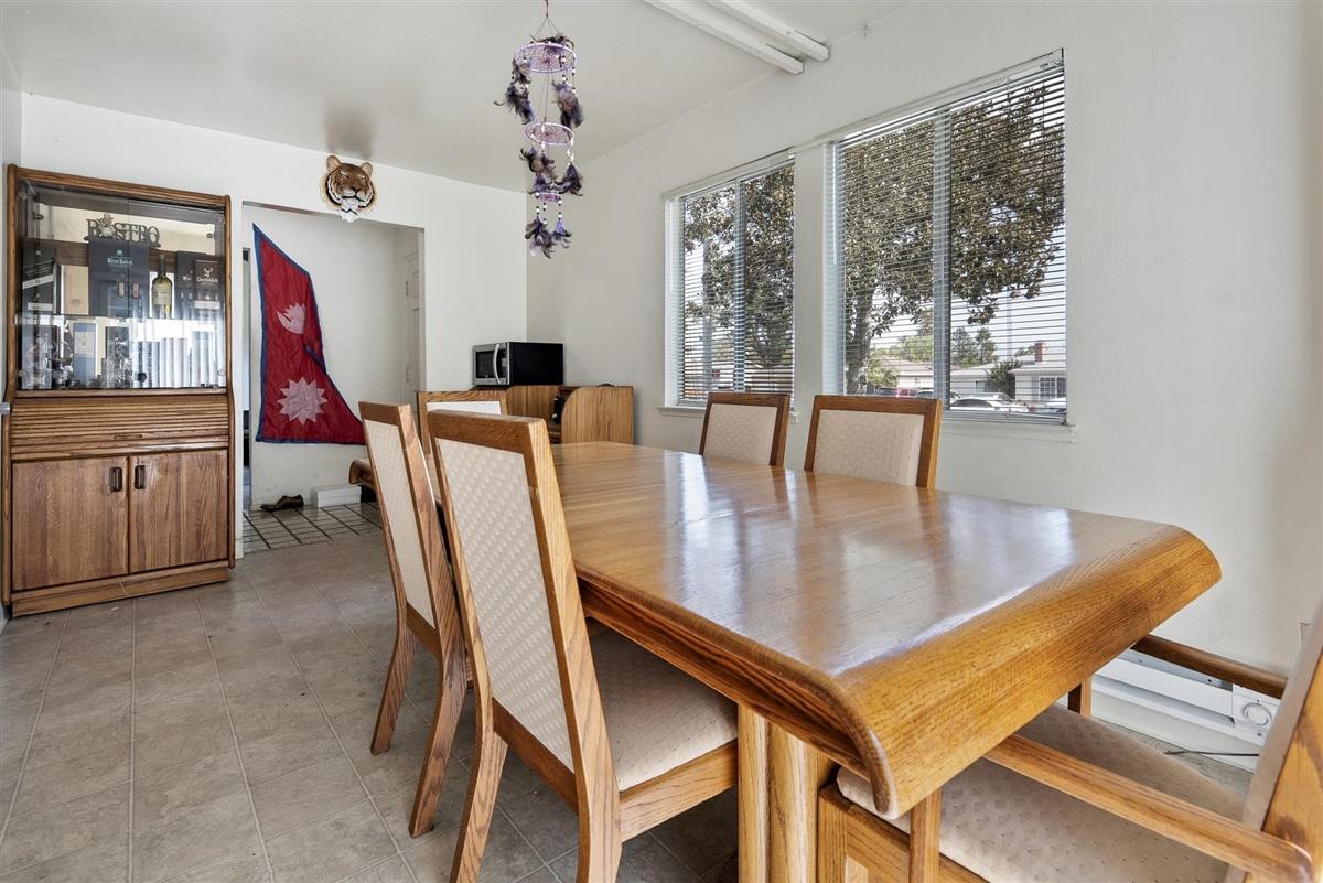 1367-1371 South Wolfe Road Sunnyvale, CA 94087 - Photo 28 of 47 a dining room with furniture and window