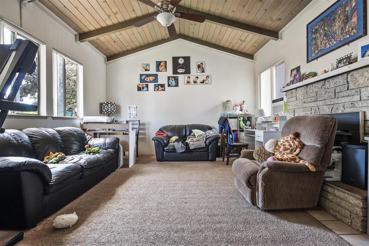 1367-1371 South Wolfe Road Sunnyvale, CA 94087 - Photo 4 of 47 a living room with furniture and a large window