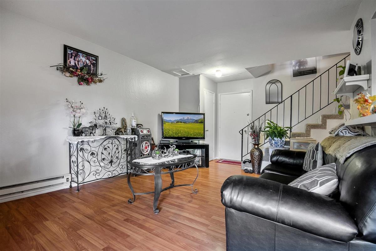 1367-1371 South Wolfe Road Sunnyvale, CA 94087 - Photo 6 of 47 a living room with furniture and wooden floor