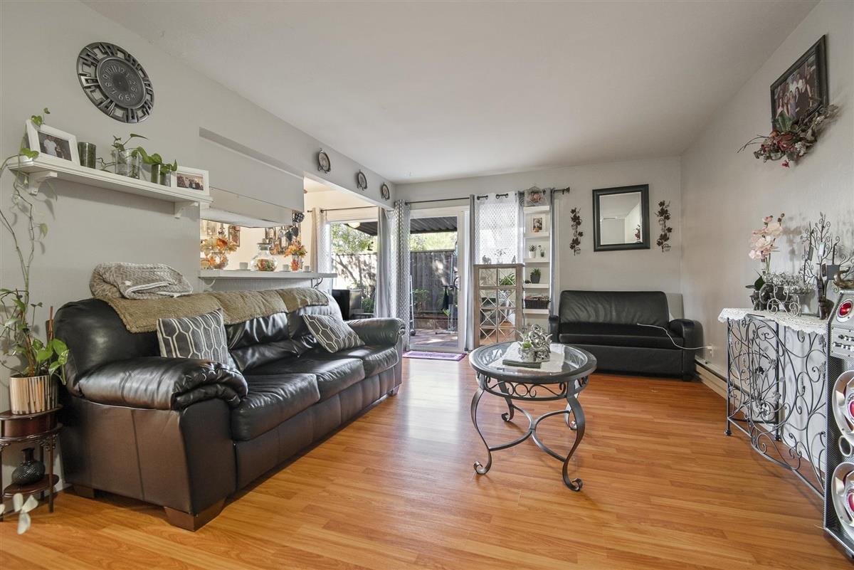1367-1371 South Wolfe Road Sunnyvale, CA 94087 - Photo 8 of 47 a living room with furniture and a fireplace