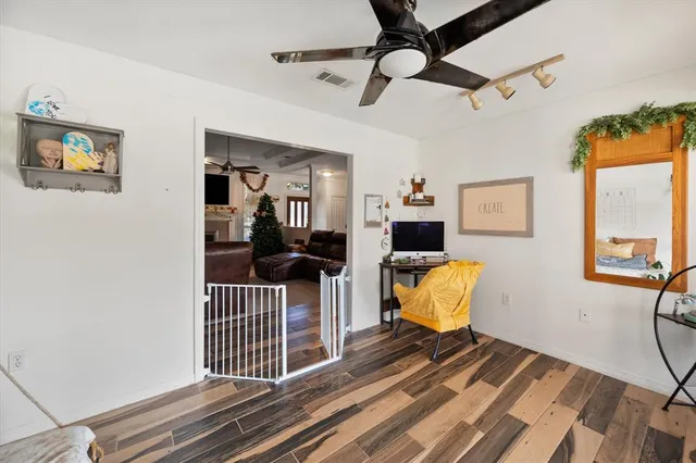 a living room with furniture and a rug