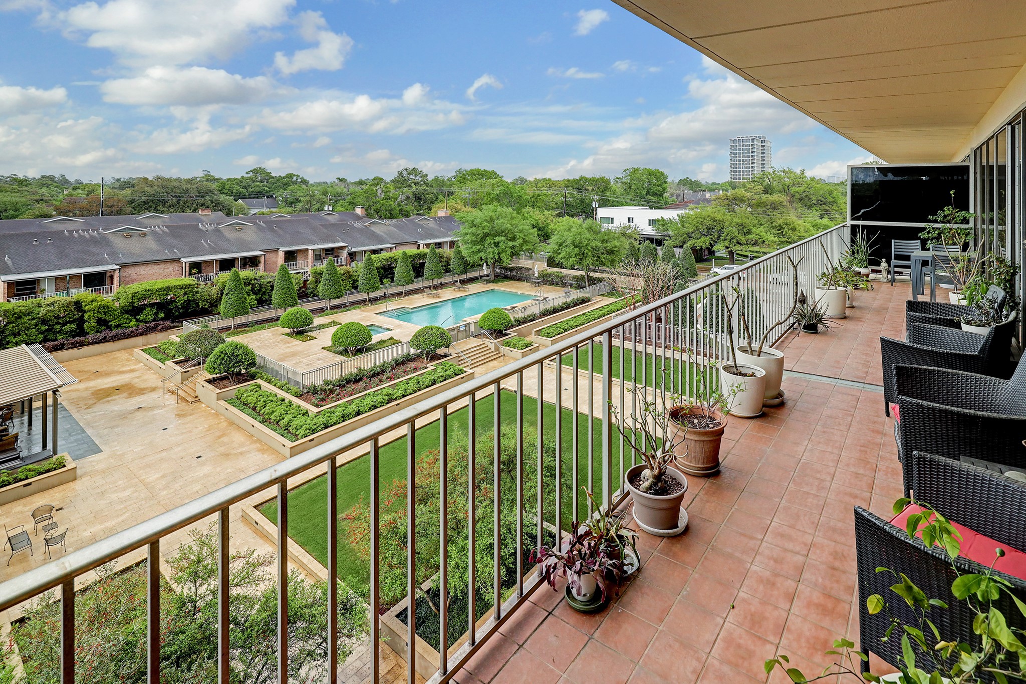 2200 Willowick Road, Unit 4E Houston, TX 77027 - Photo 16 of 17 a view of balcony with furniture
