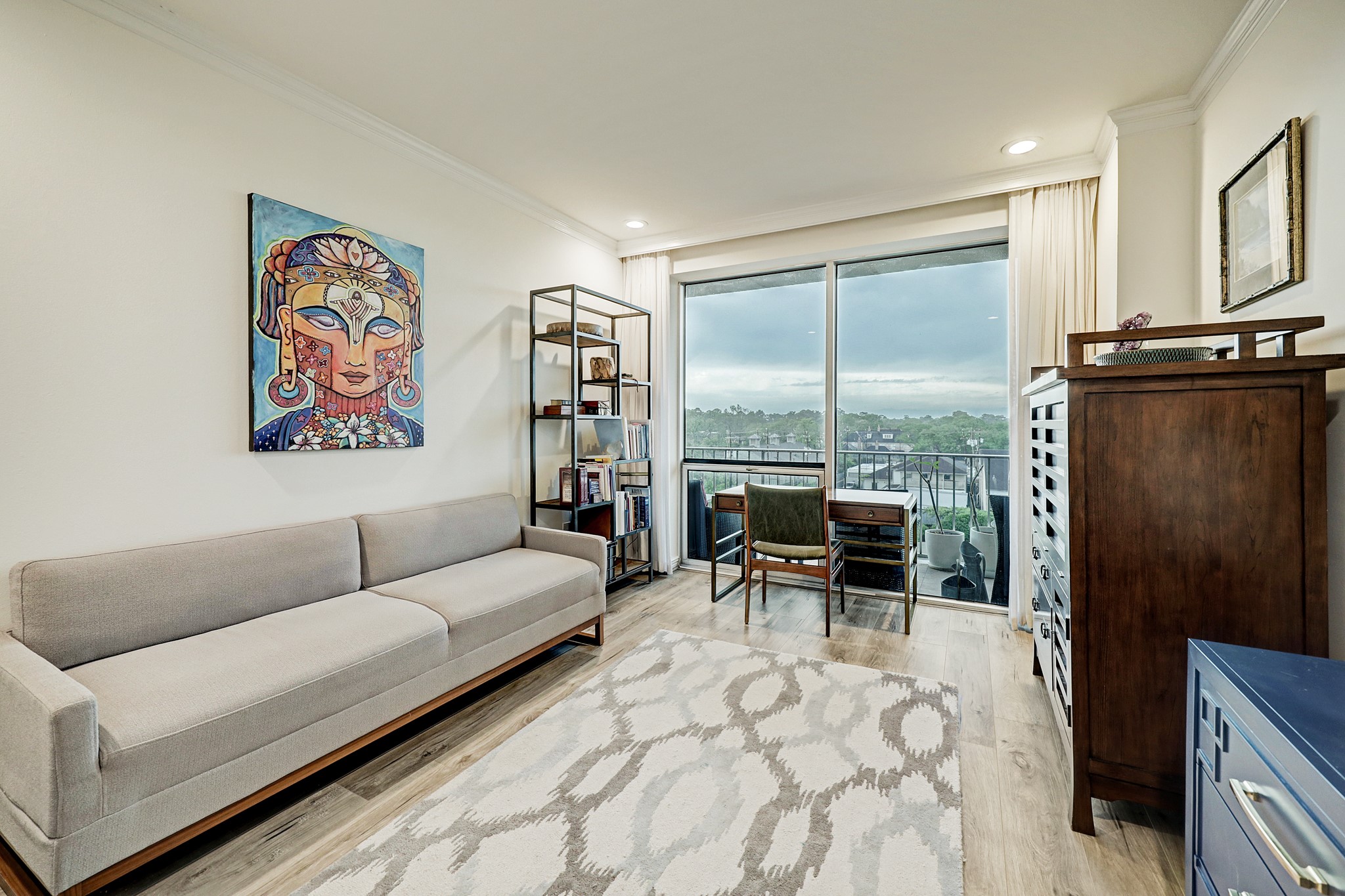 2200 Willowick Road, Unit 4E Houston, TX 77027 - Photo 10 of 17 a living room with furniture and a large window