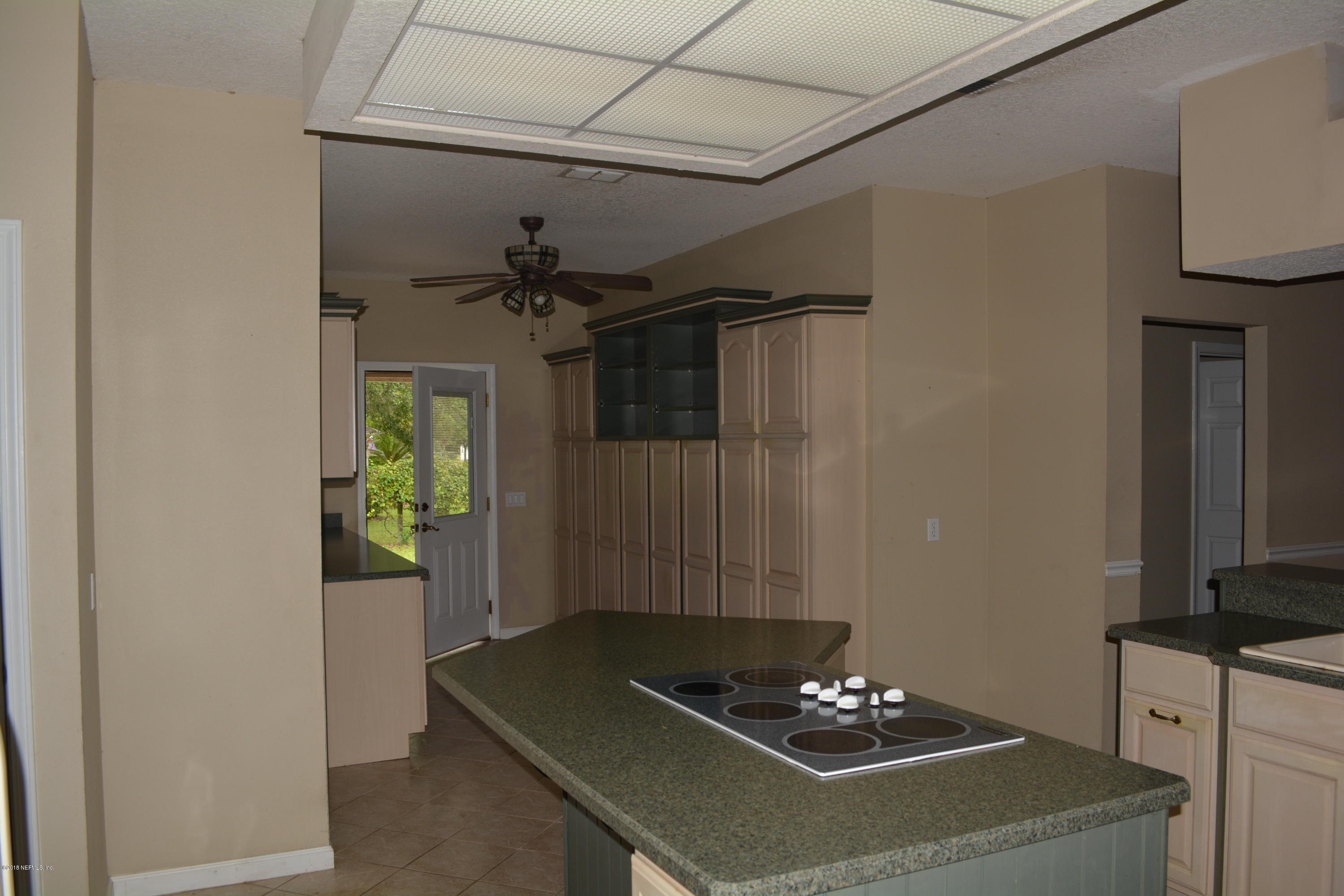 4203 Raintree Drive Macclenny, FL 32063 - Photo 11 of 26 Kitchen Island Cooktop