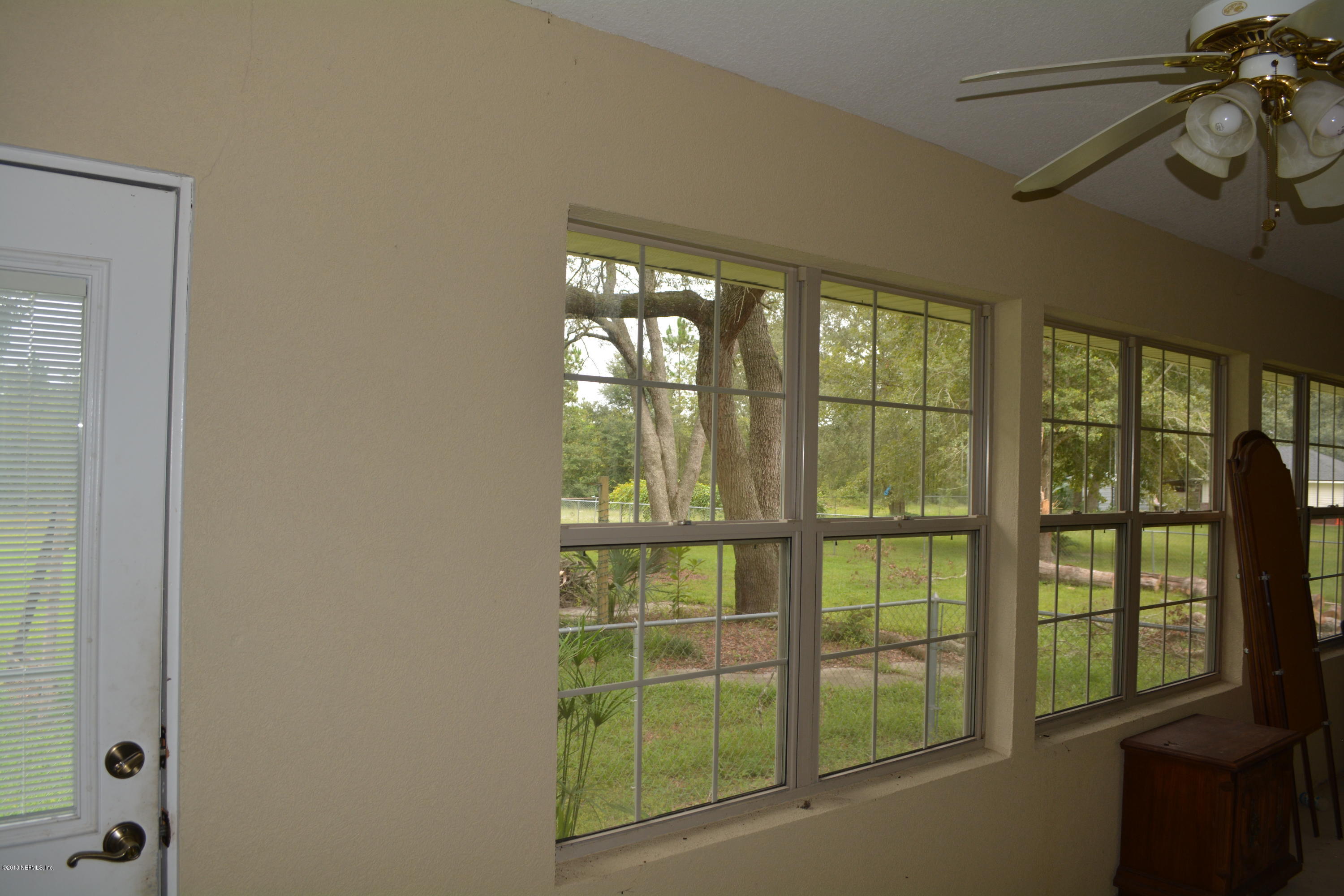 4203 Raintree Drive Macclenny, FL 32063 - Photo 22 of 26 Florida room