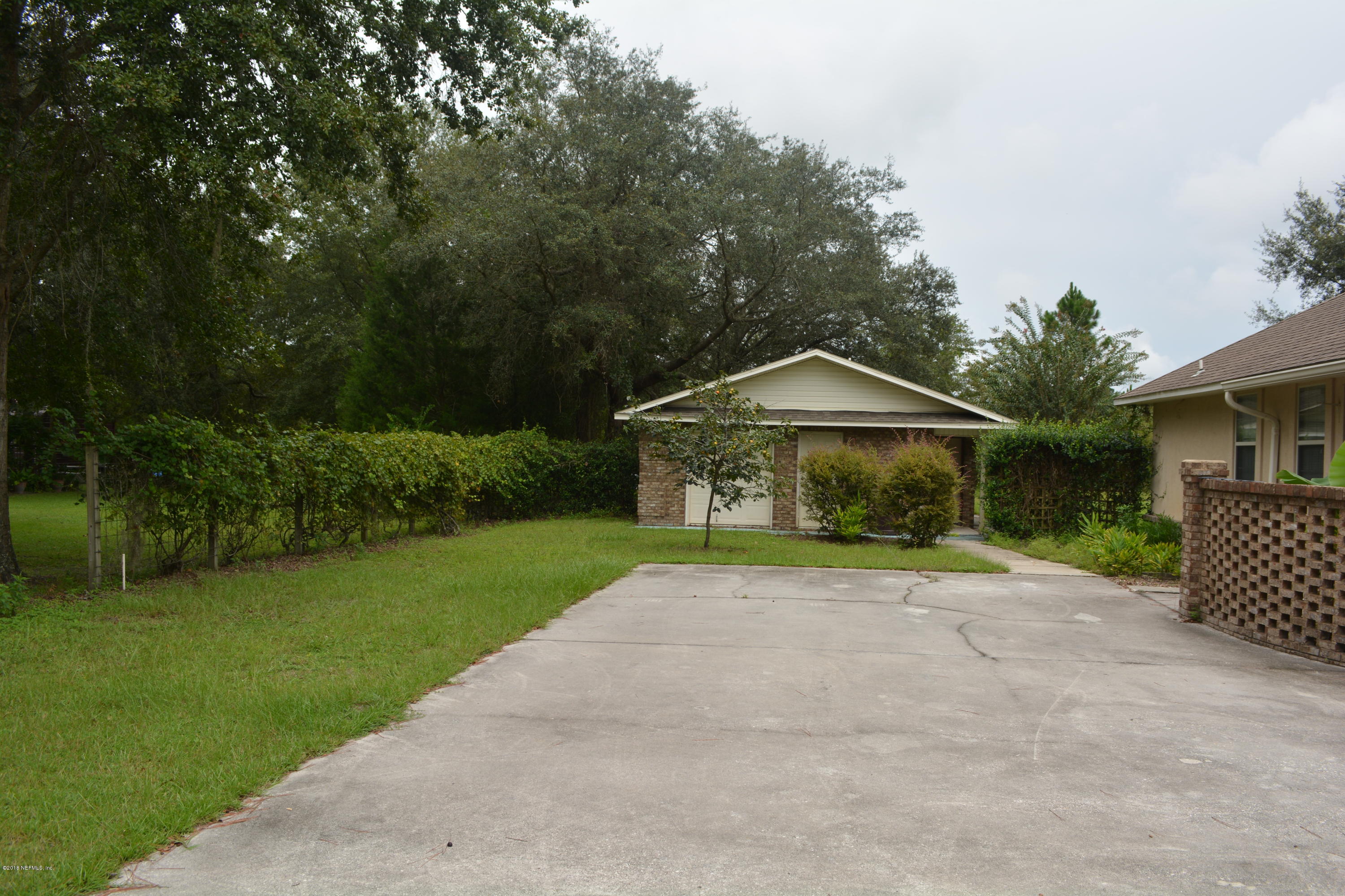 4203 Raintree Drive Macclenny, FL 32063 - Photo 8 of 26 Driveway/Detached Garage