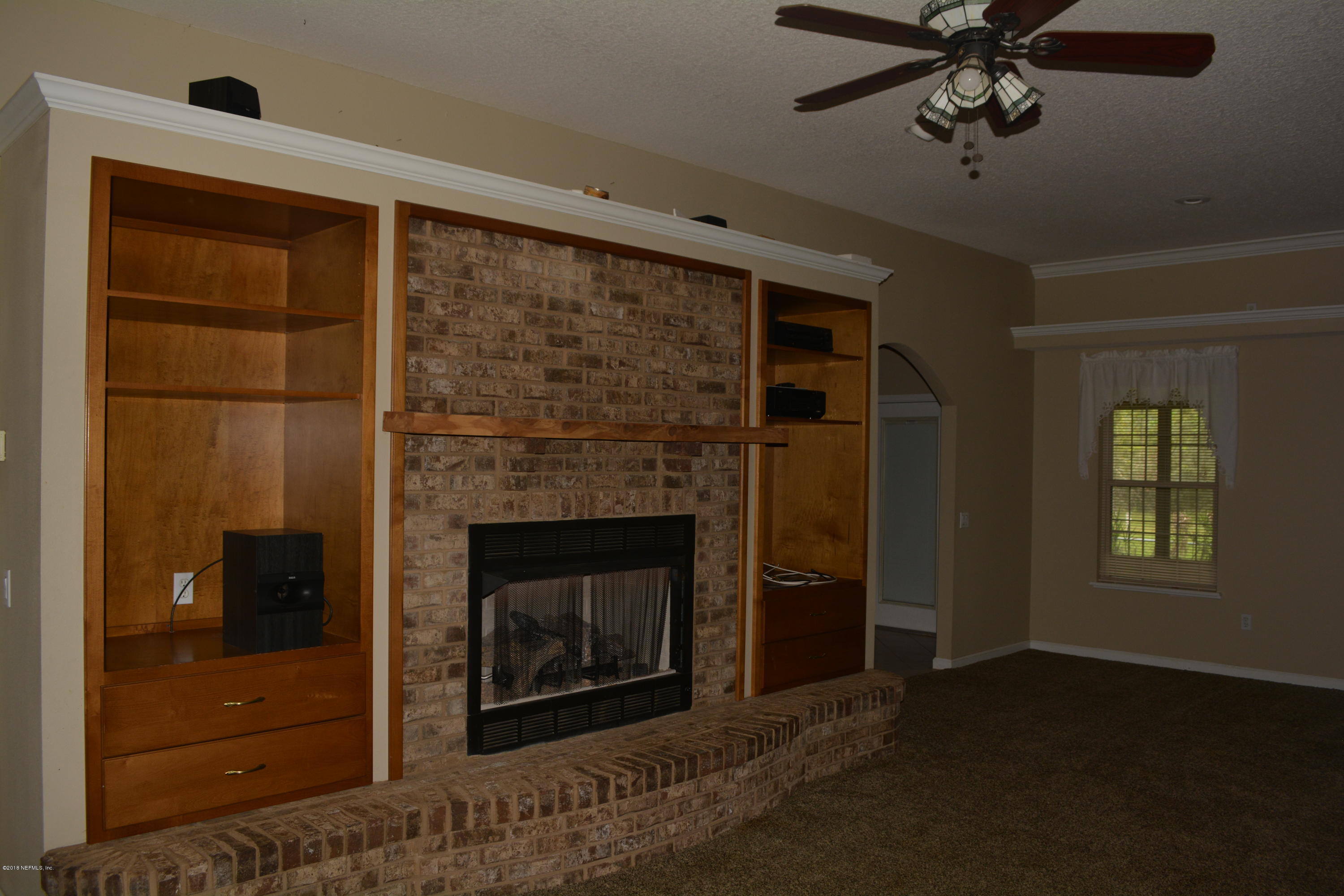 4203 Raintree Drive Macclenny, FL 32063 - Photo 10 of 26 Fireplace with built ins
