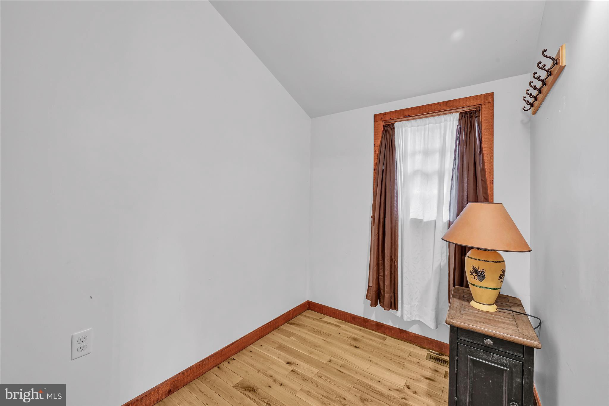 16 Short Lane Jonestown, PA 17038 - Photo 14 of 36 a view of a livingroom with wooden floor and a ceiling fan