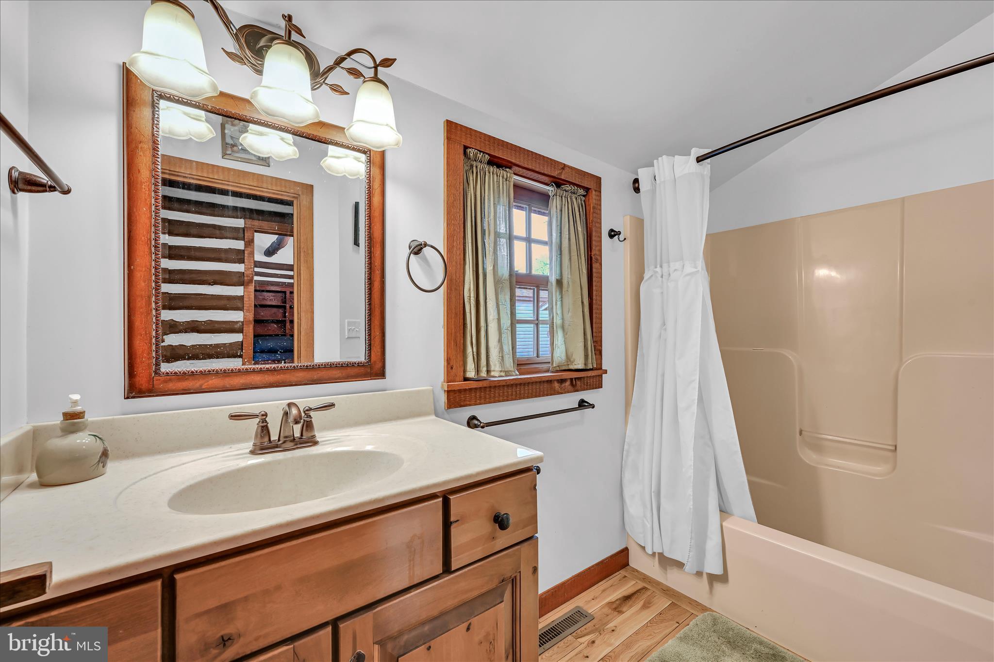 16 Short Lane Jonestown, PA 17038 - Photo 10 of 36 a bathroom with a sink and a mirror