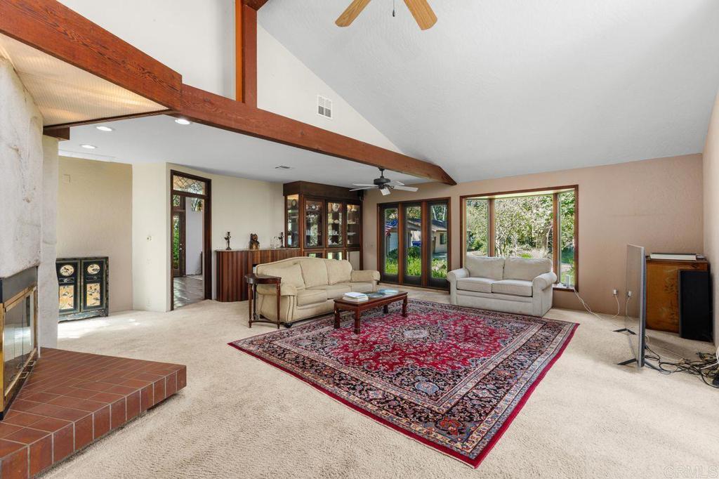 29560 Lilac Road Valley Center, CA 92082 - Photo 15 of 43 a living room with furniture rug and a rug
