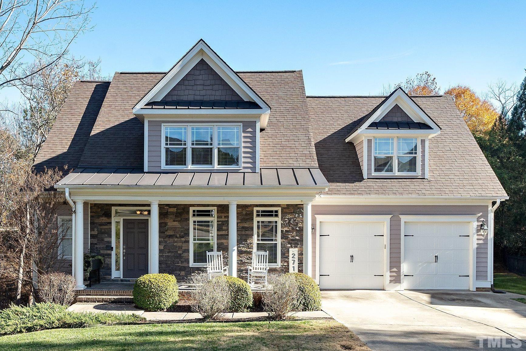 2717 Peachleaf Street Raleigh, NC 27614 - Photo 1 of 42 a front view of a house with a yard