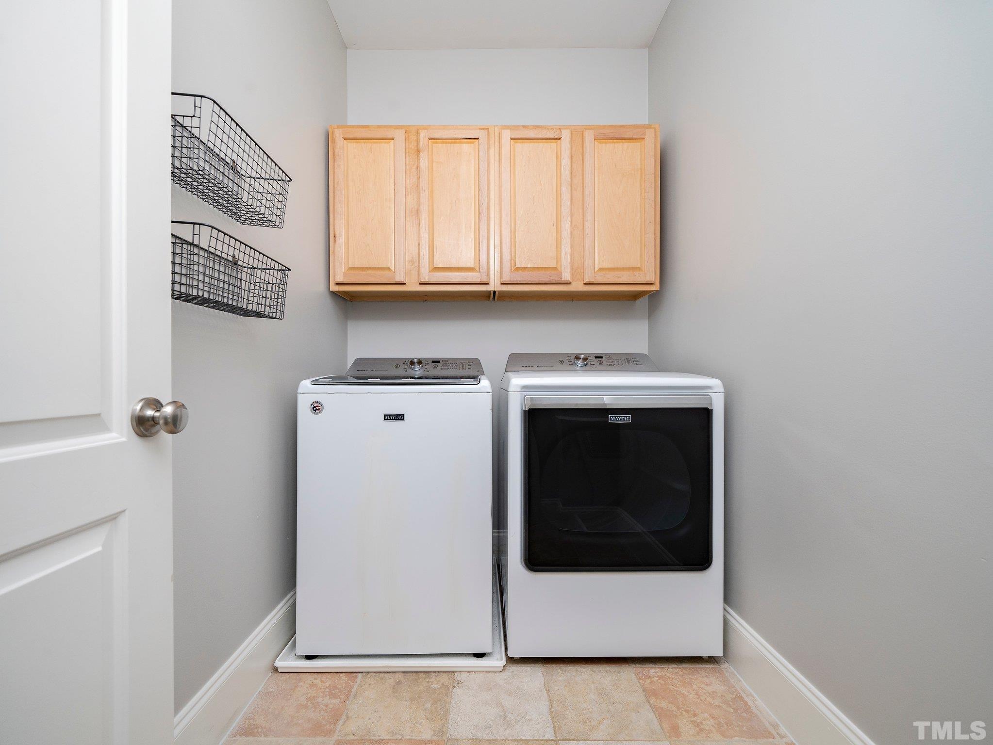 2717 Peachleaf Street Raleigh, NC 27614 - Photo 28 of 42 a utility room with dryer and washer