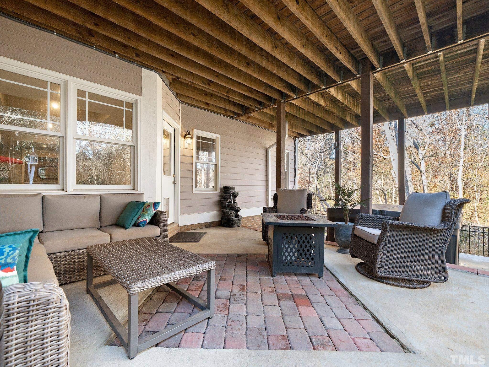 2717 Peachleaf Street Raleigh, NC 27614 - Photo 35 of 42 a living room with furniture a wooden floor and window