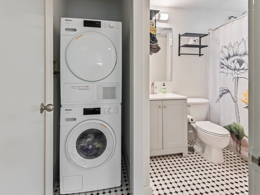 28 Adams Street, Unit 102 Worcester, MA 01604 - Photo 18 of 34 a bathroom with a toilet and a sink