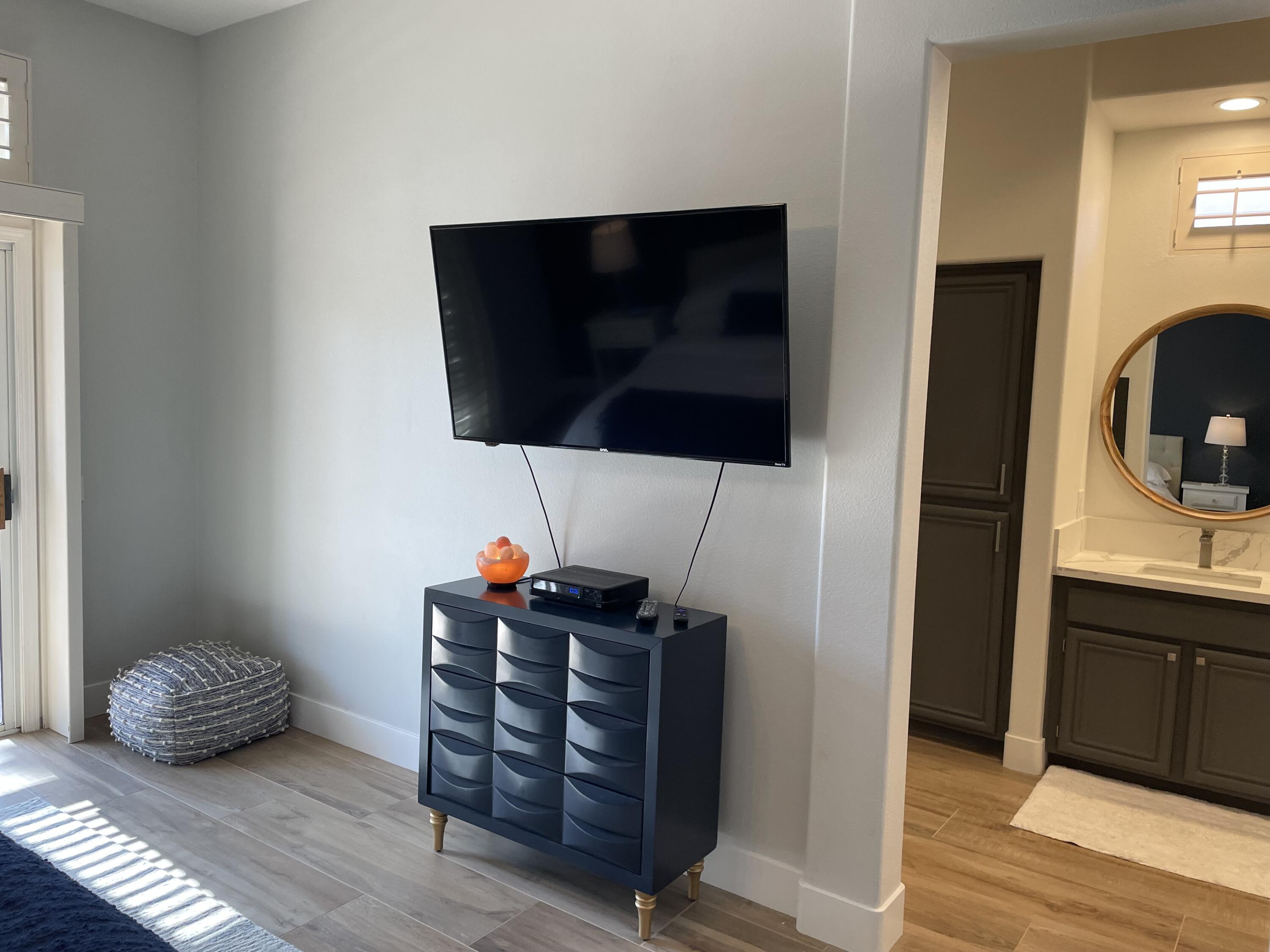 38286 Brandywine Avenue Palm Desert, CA 92211 - Photo 19 of 22 a living room with furniture and a flat screen tv