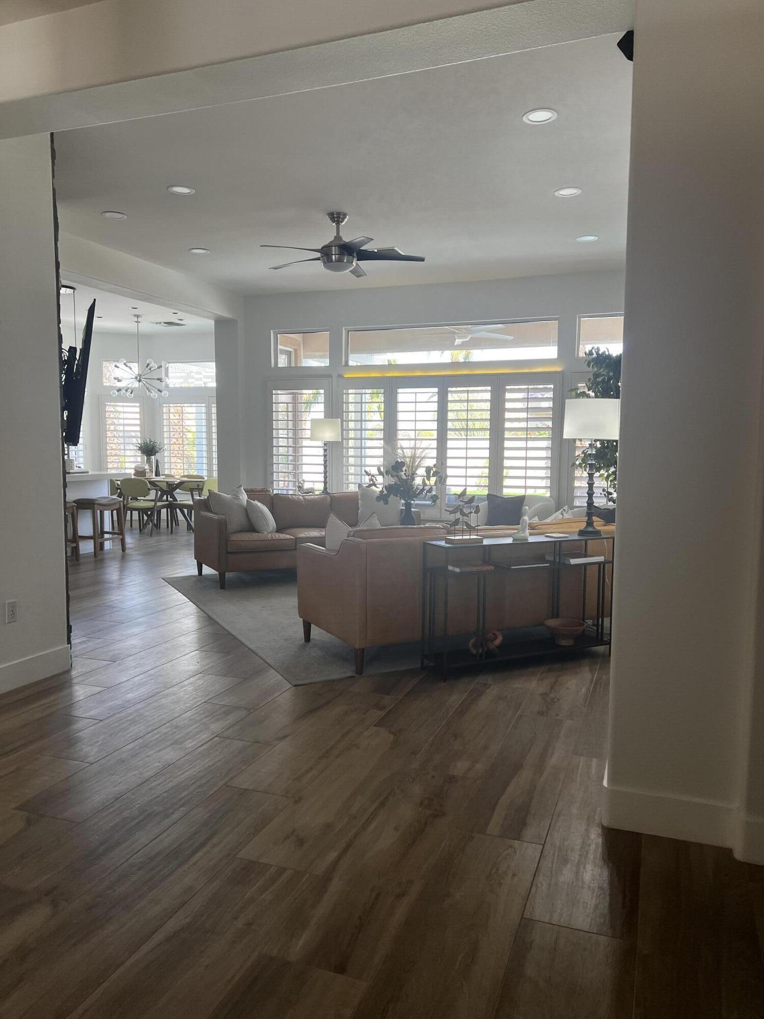 38286 Brandywine Avenue Palm Desert, CA 92211 - Photo 3 of 22 a living room with furniture and a large window
