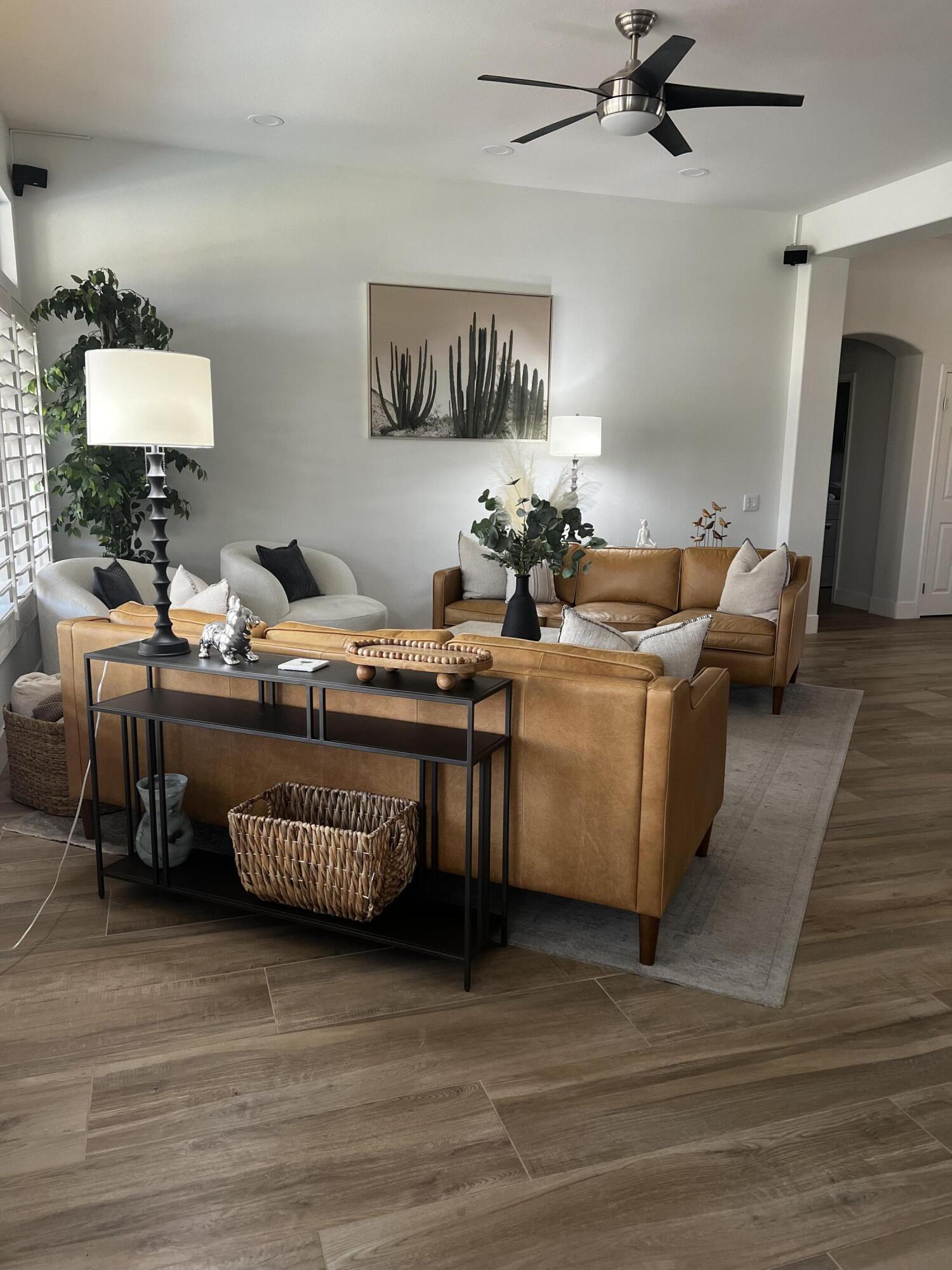 38286 Brandywine Avenue Palm Desert, CA 92211 - Photo 6 of 22 a living room with furniture and a wooden floor
