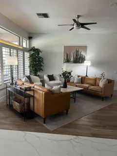 a living room with furniture and window