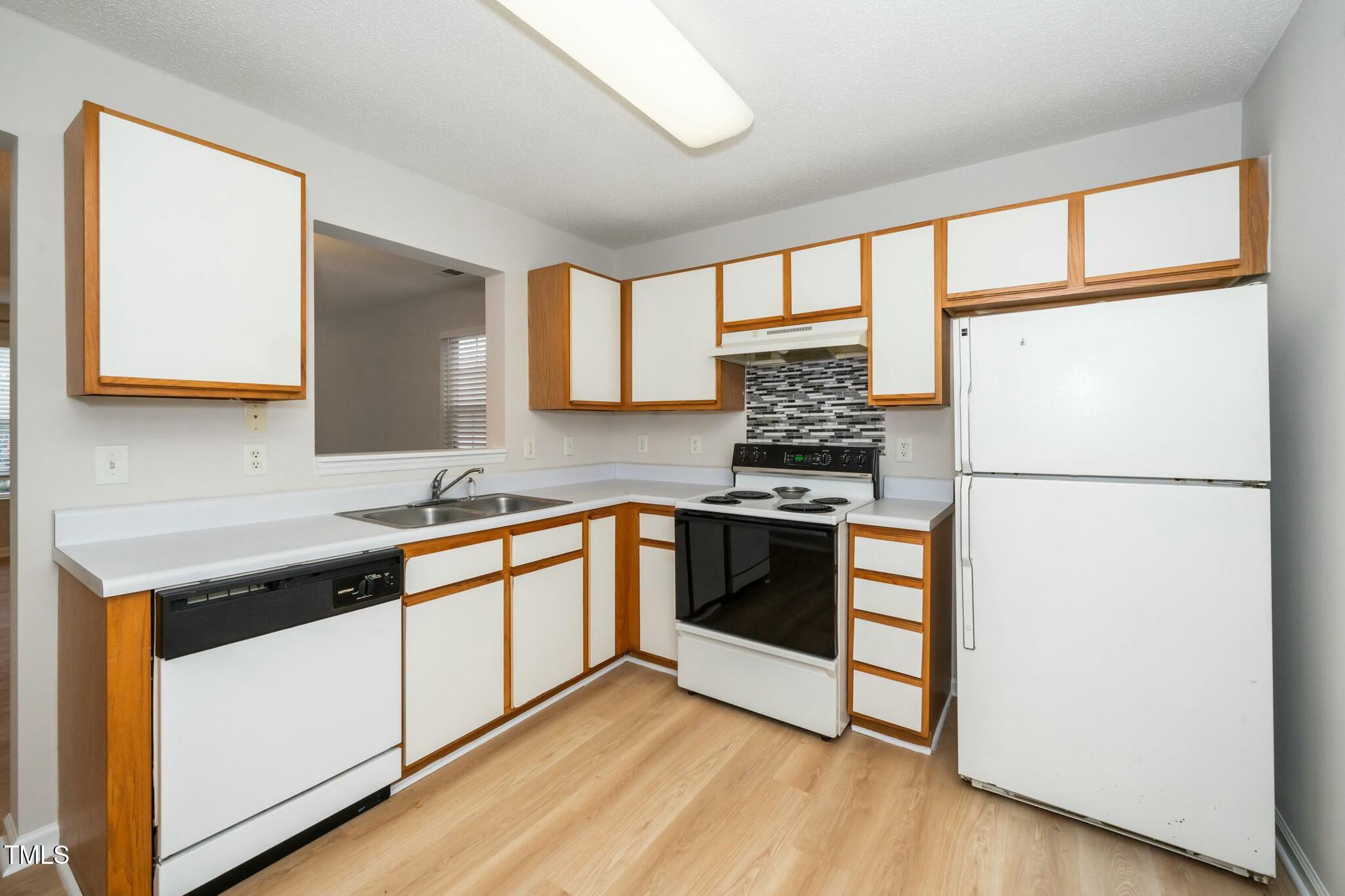 231 Donald Ross Drive Raleigh, NC 27610 - Photo 3 of 18 tempImagekVaNZe