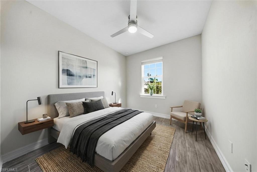 1059 Enbrook Loop Naples, FL 34114 - Photo 20 of 40 Bedroom featuring a ceiling fan and wood finish floors
