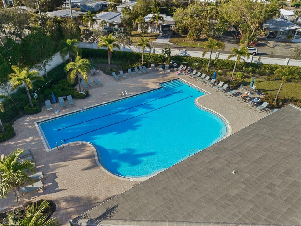 1059 Enbrook Loop Naples, FL 34114 - Photo 34 of 40 Community pool featuring a patio