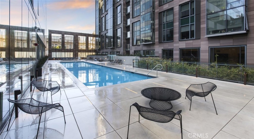 100 Van Ness Avenue, Unit 402 San Francisco, CA 94102 - Photo 18 of 75 a view of a swimming pool with a lounge chairs