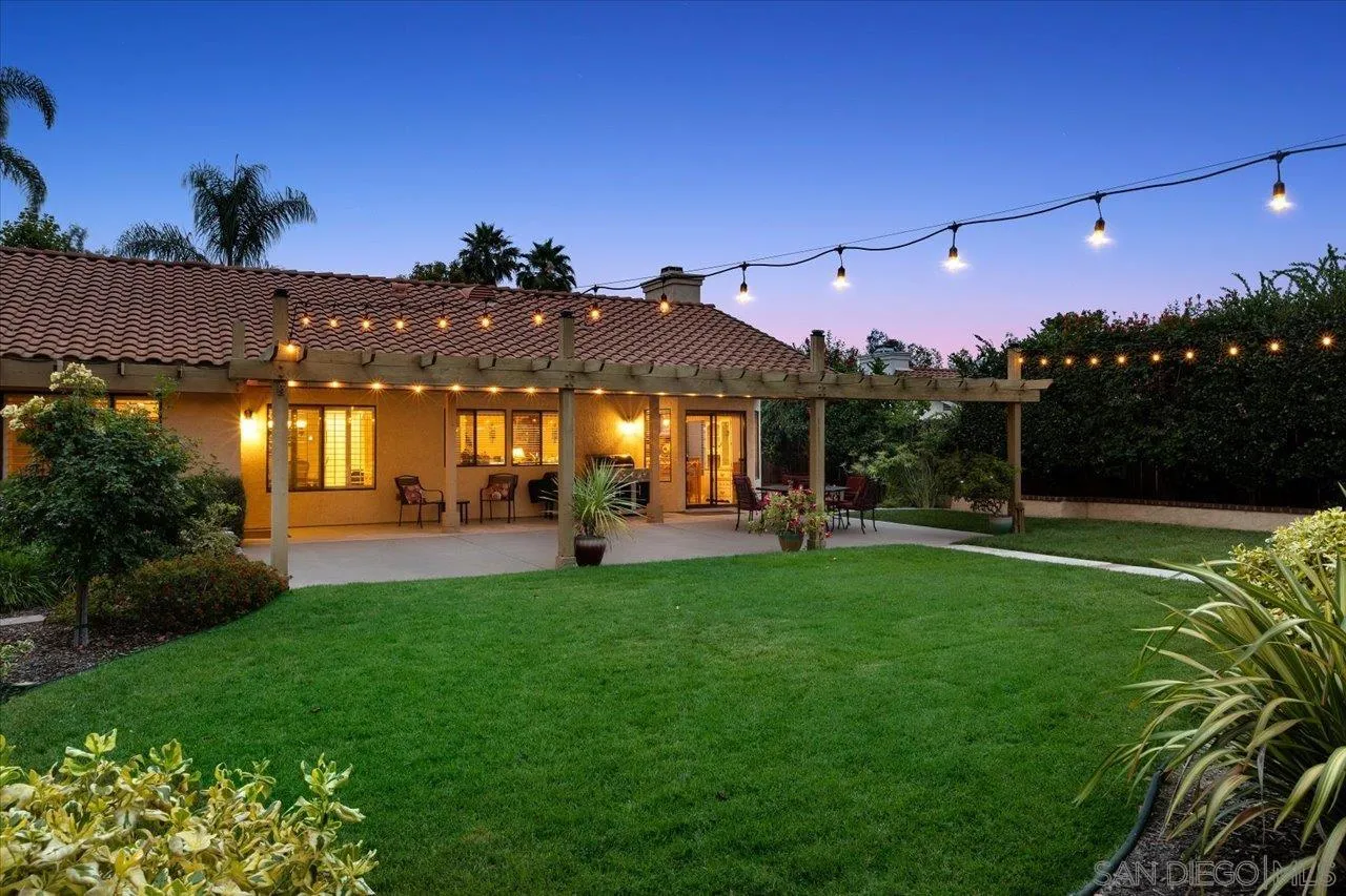 1787 Wolverine Way Vista, CA 92084 - Photo 6 of 35 a front view of a house with a garden