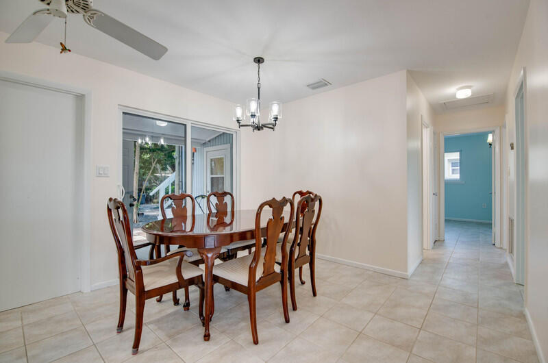 1006 16th Terrace Key West, FL 33040 - Photo 13 of 49 a dining room with furniture and chandelier